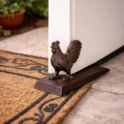 Ozdobny żeliwny stoper do drzwi z kogutem